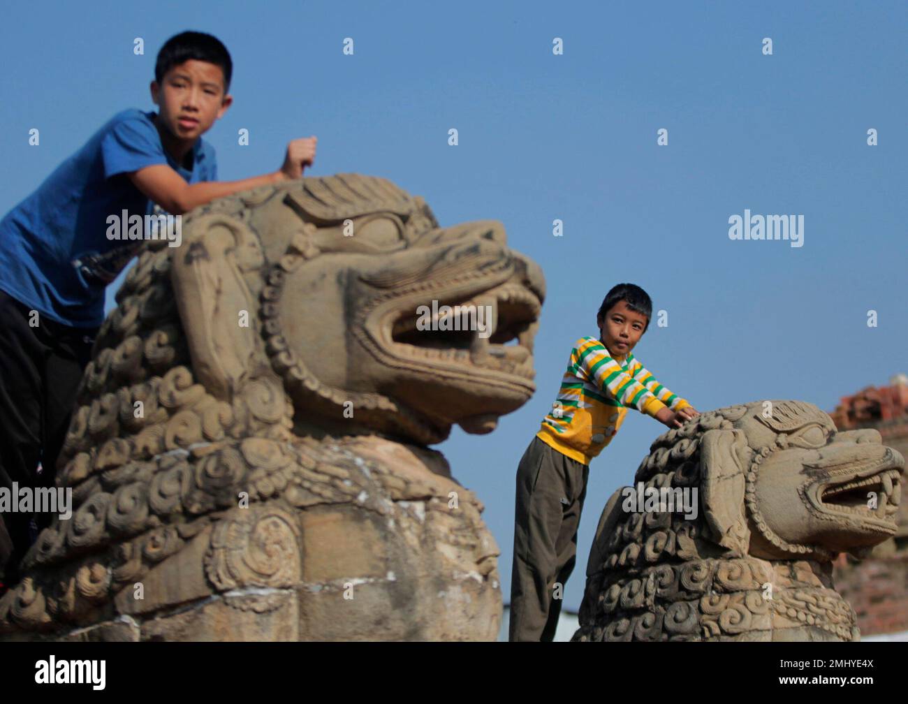 Young Nepalese Boys Watch Goats Being Sacrificed At A Hindu Temple young-nepalese-boys-watch-goats-being-sacrificed-at-a-hindu-temple