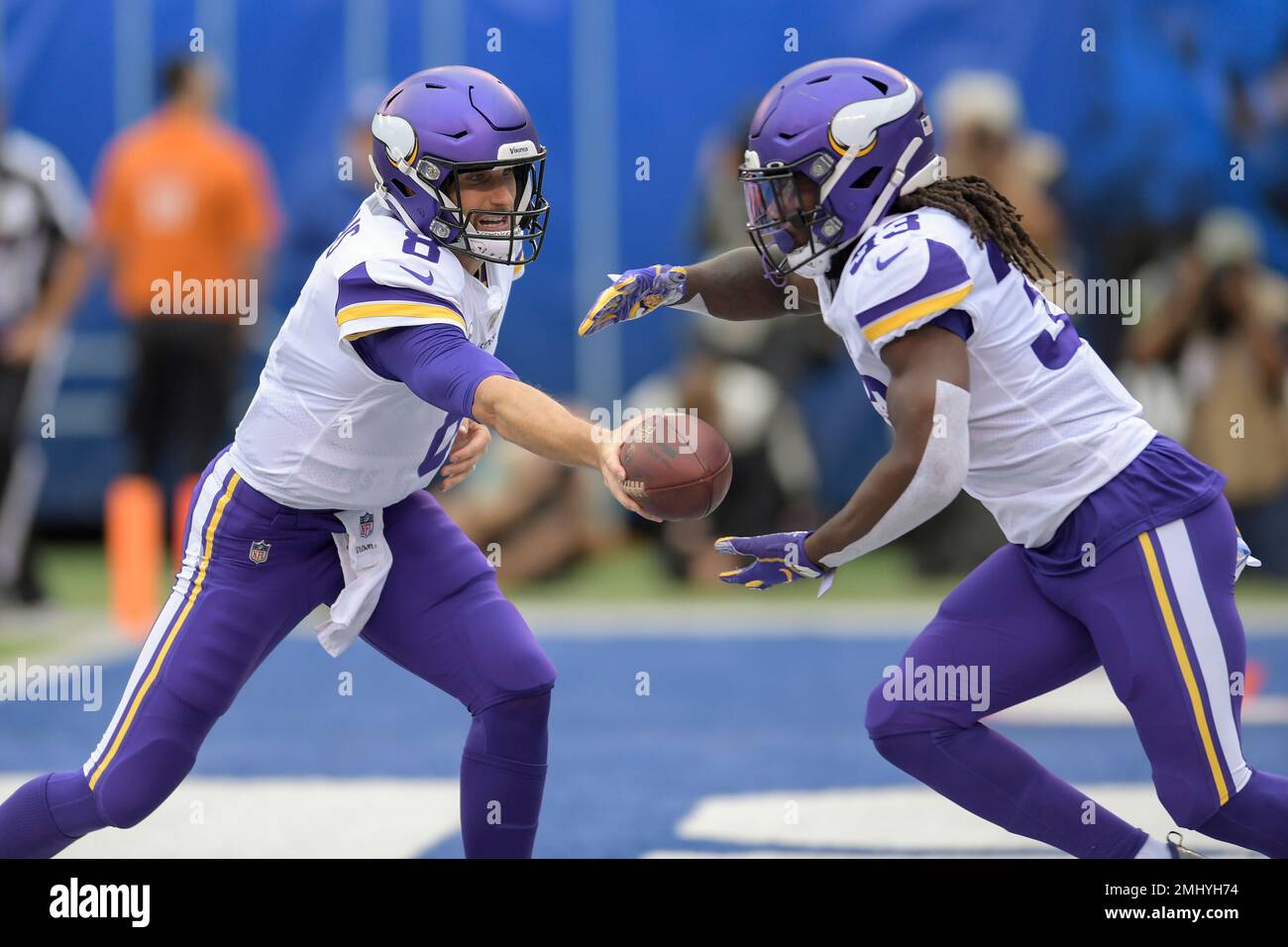 Minnesota Vikings quarterback Kirk Cousins looks to hand off the ball