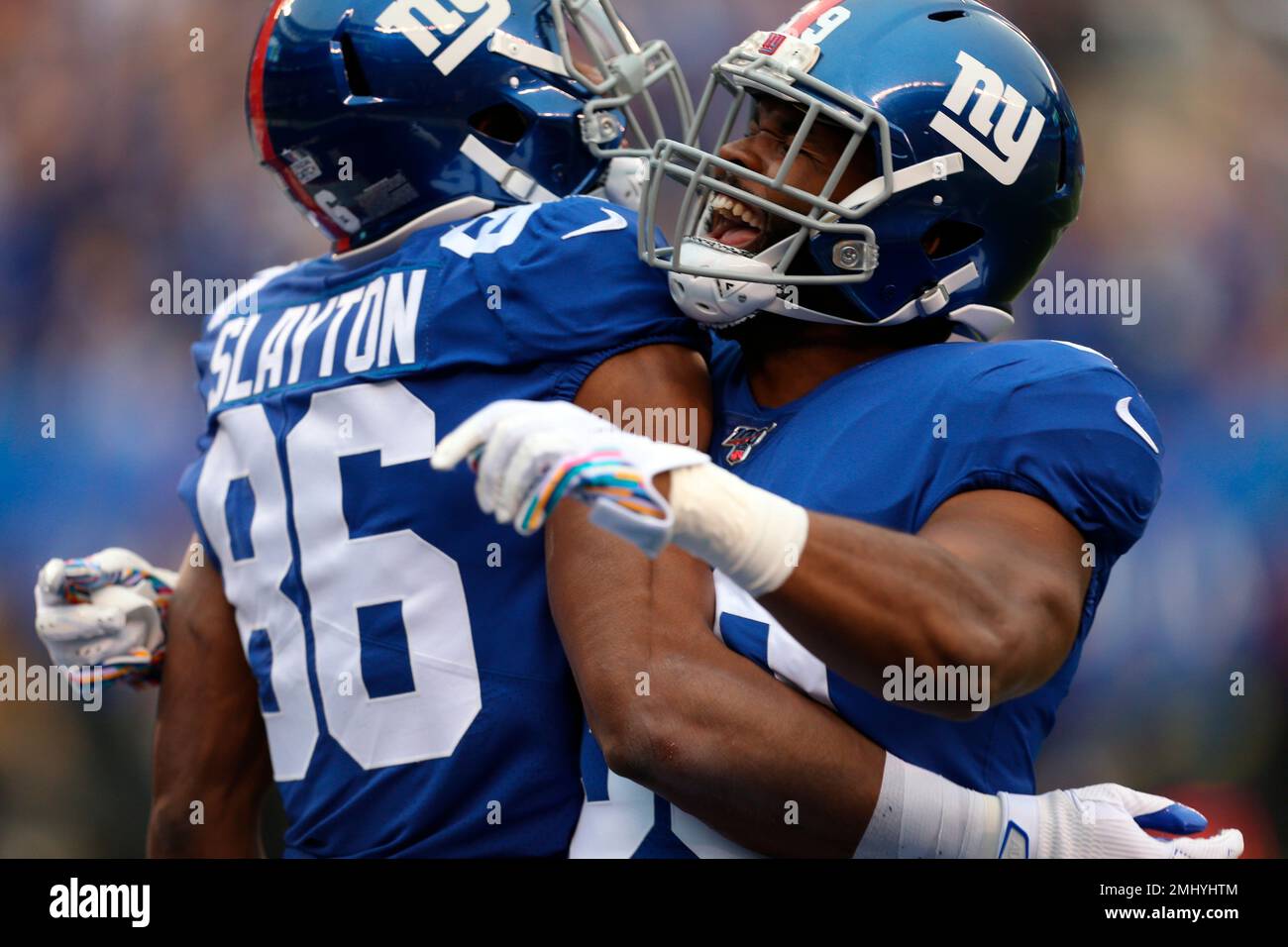 New York Giants wide receiver Darius Slayton (86) and *New York Giants  running back Elijhaa Penny (39) celebrate after scoring touchdown against  Minnesota Vikings during an NFL football game on Sunday, Oct