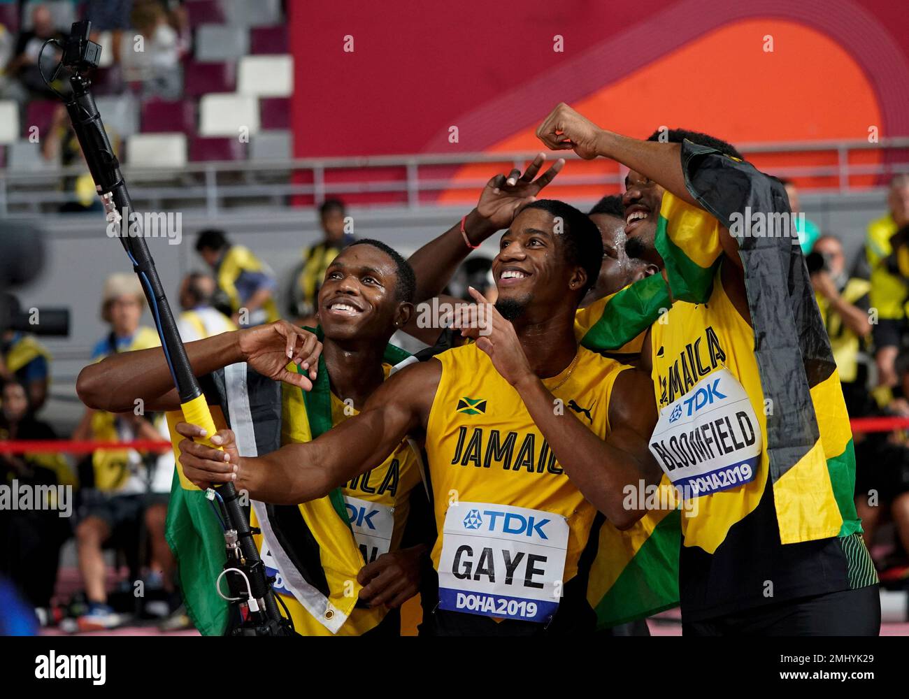 The Jamaican team celebrate their silver medal in the men's 4x400 meter