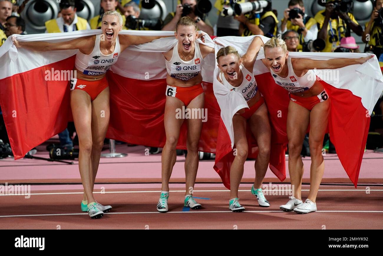 Poland celebrates their silver medals in the women's 4x400 meter relay