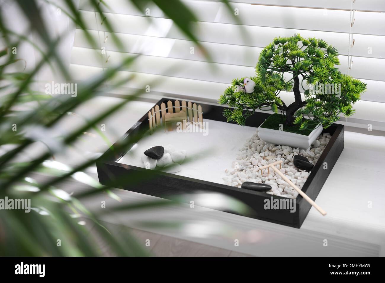 Beautiful miniature zen garden on window sill Stock Photo - Alamy