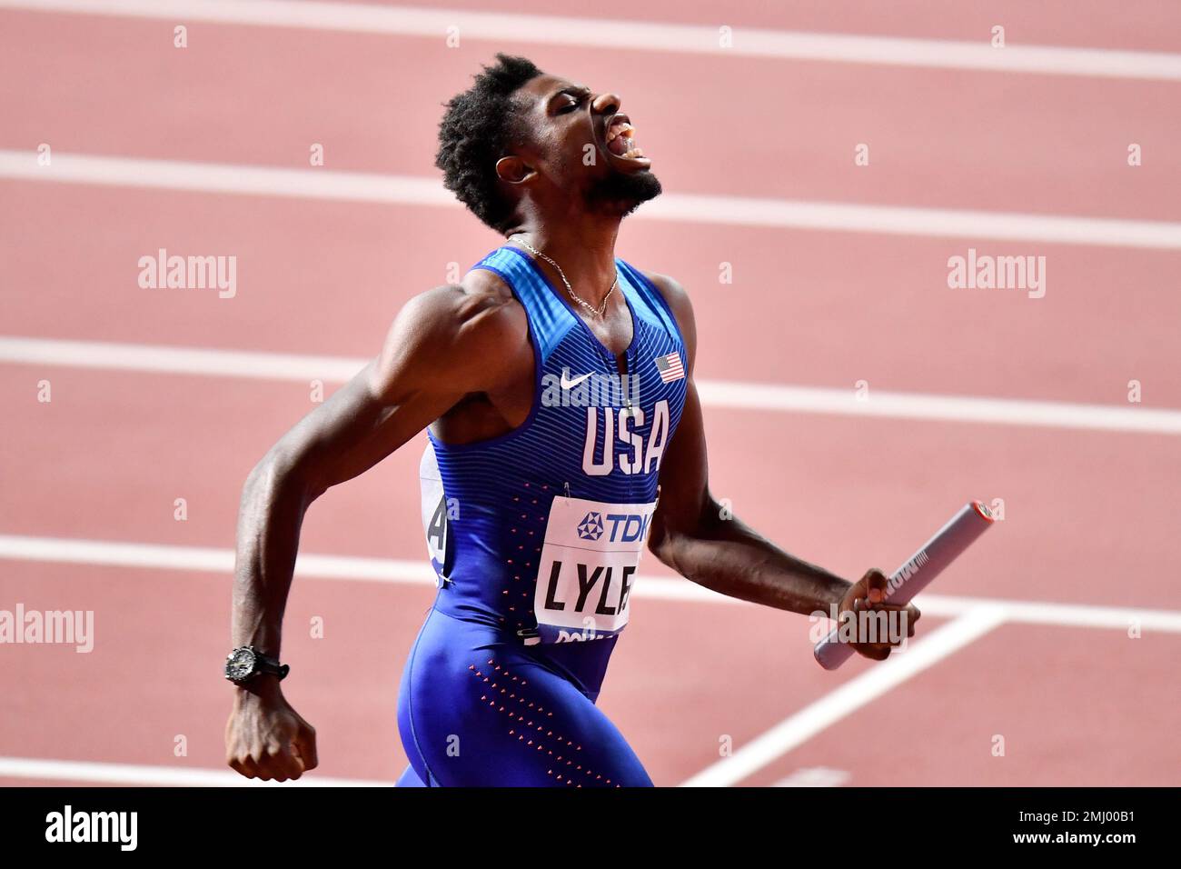 Noah Lyles of the United States reacts after winning the men's 4x100