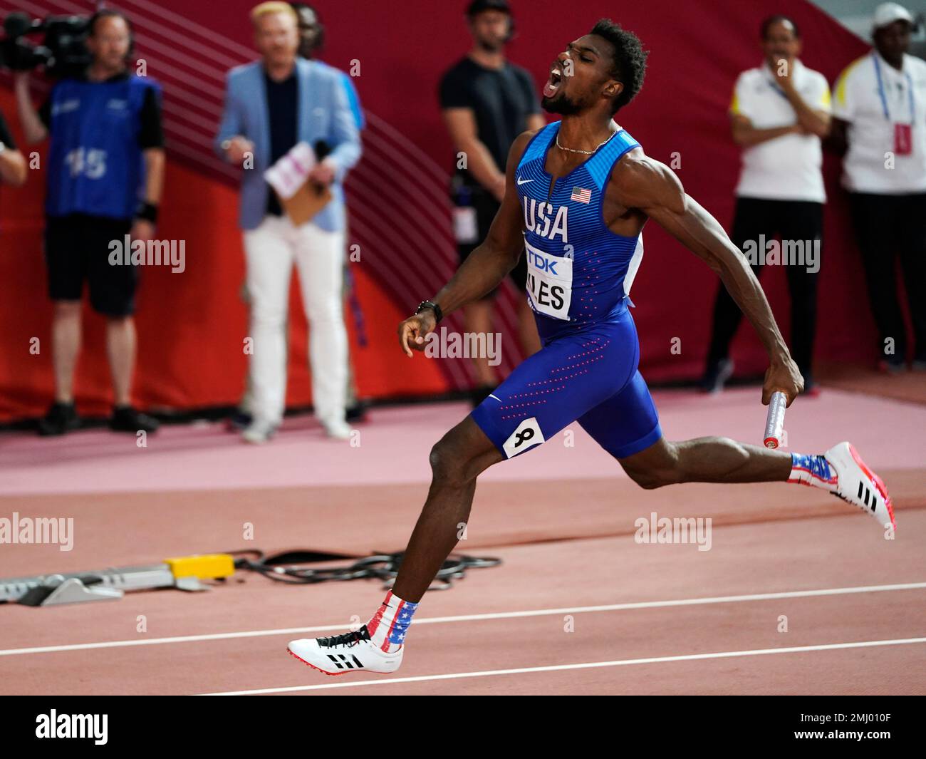 Noah Lyles of the United States celebrates a 4x100 men's relay gold at