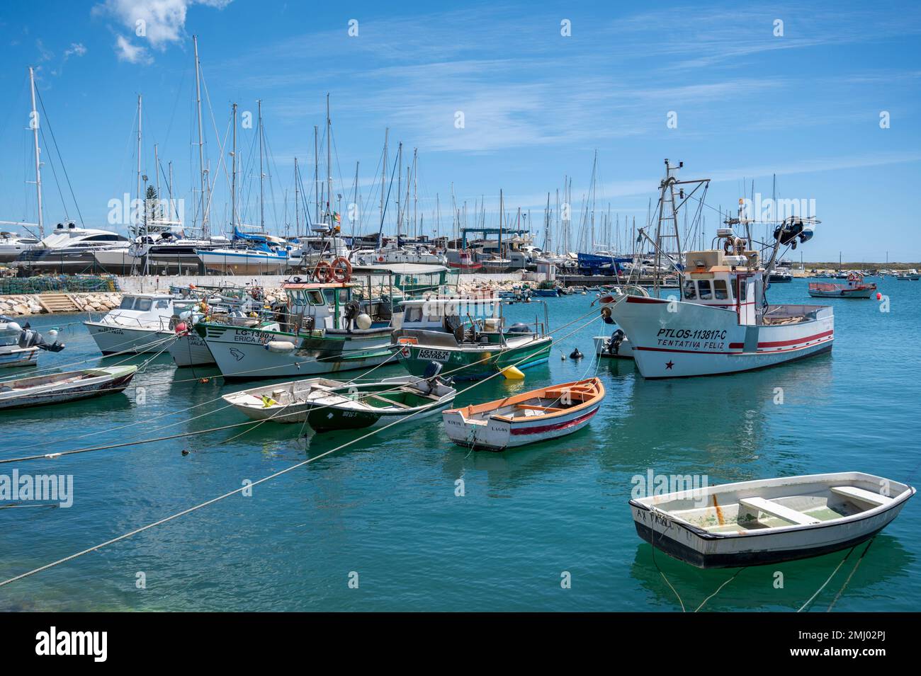 Fishing boats in the harbour or marina at Lagos Algarve Portugal Stock Photo