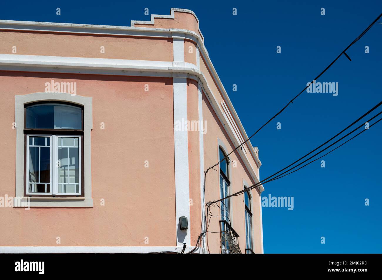A terracotta painted traditional building in LagosAlagarve Portugal Stock Photo