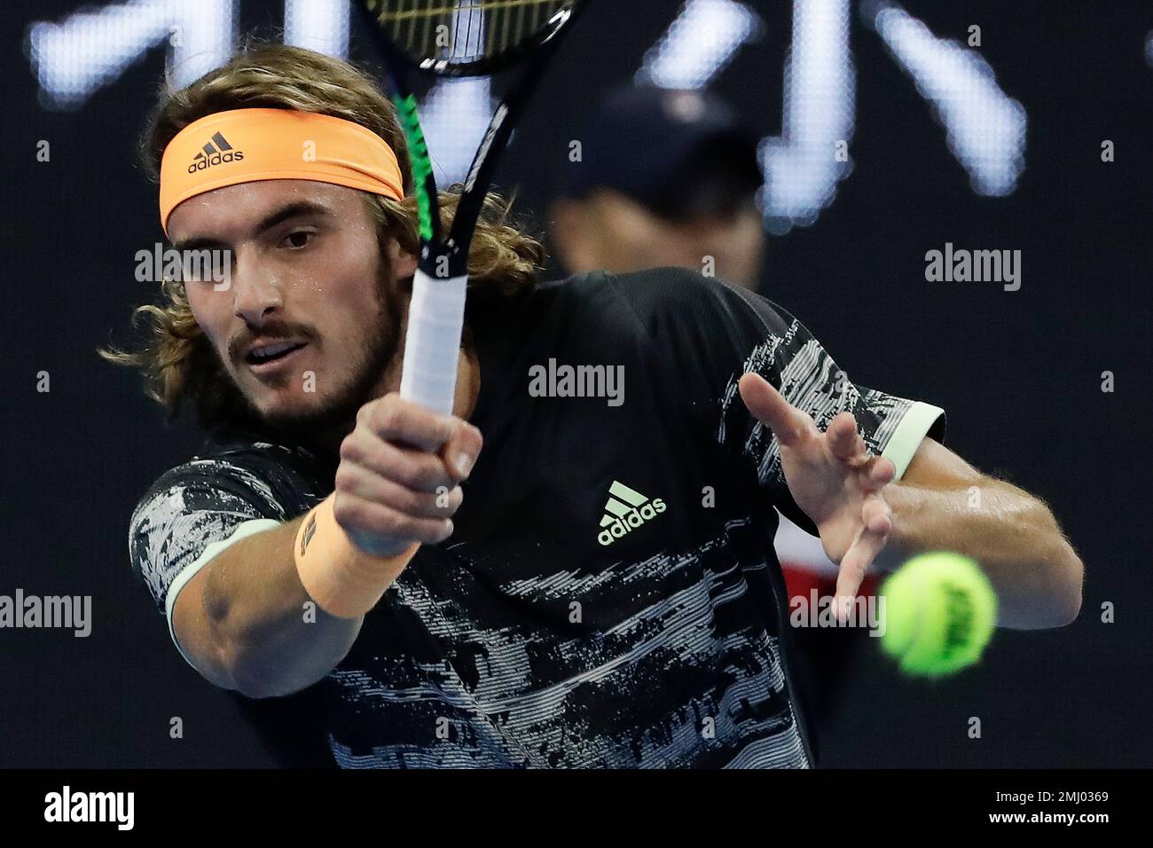 Stefanos Tsitsipas of Greece hits a return shot against Alexander Zverev of Germany during the mens semifinals match in the China Open tennis tournament in Beijing, Saturday, Oct