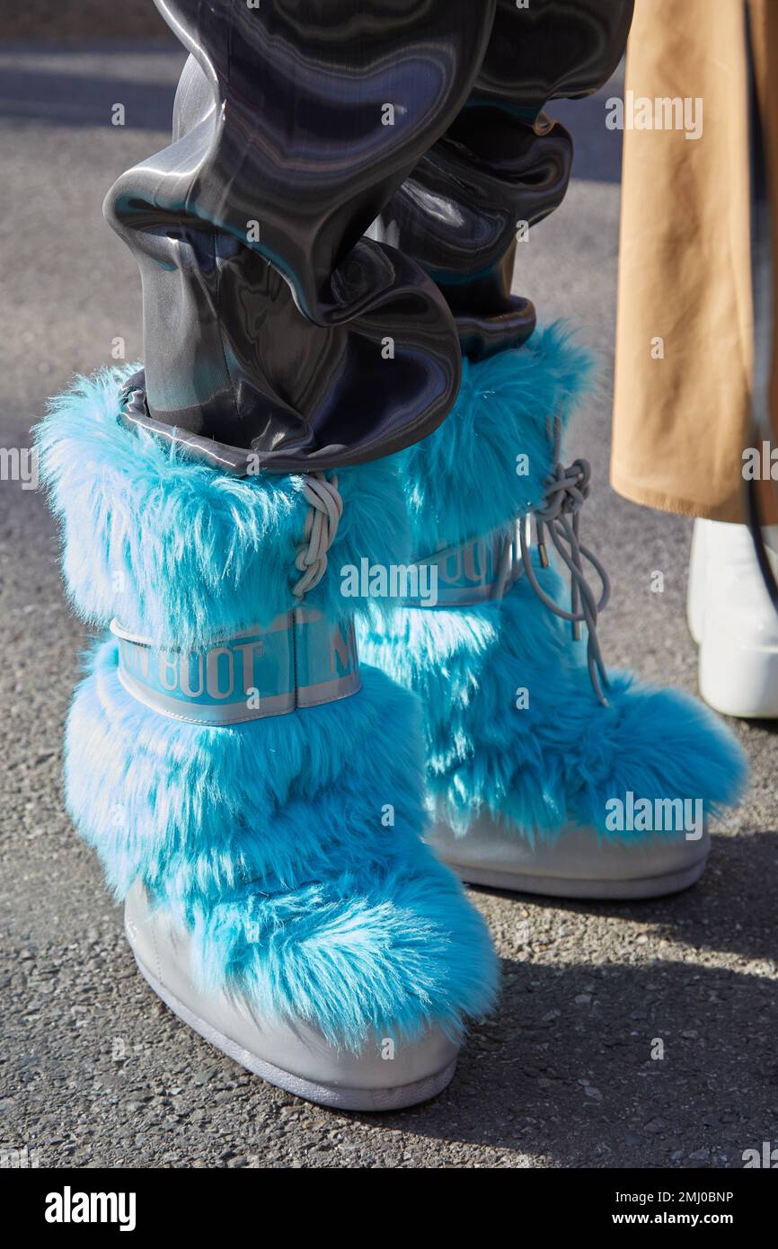 MILAN, ITALY - JANUARY 14, 2023: Man with light blue fur Moon Boot boots  before Emporio Armani fashion show, Milan Fashion Week street style Stock  Photo - Alamy