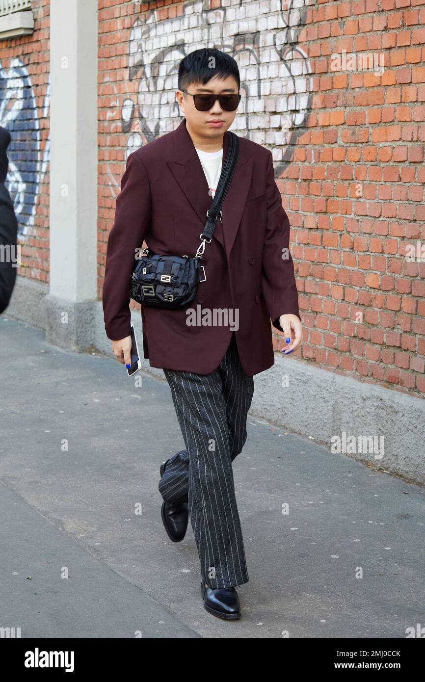 Declan Chan MILAN, ITALY - JANUARY 14, 2023: Declan Chan before Fendi fashion show ...