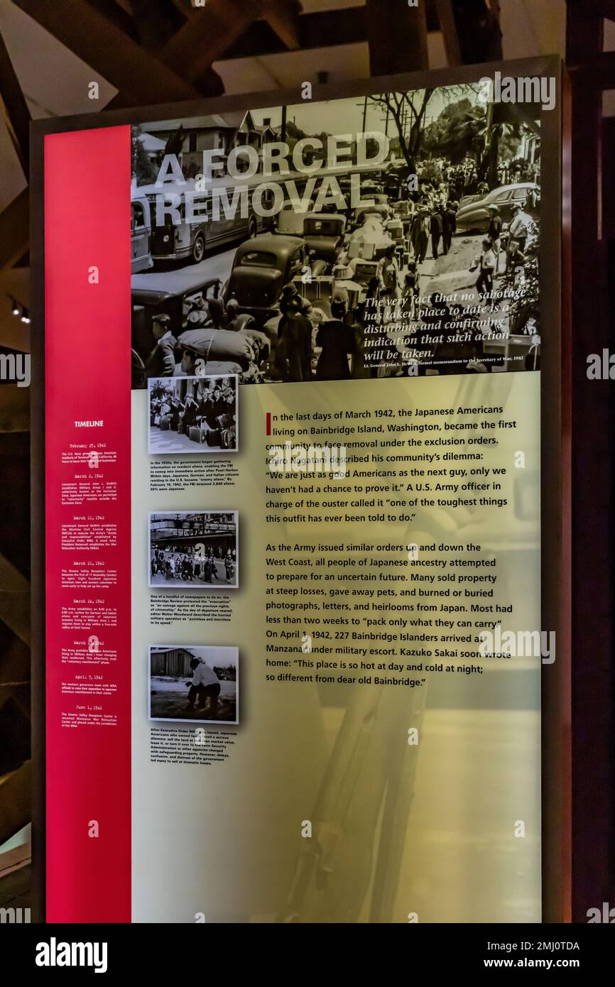 Exhibit about forced removal of people from Bainbridge Island, NPS Visitor Center at Manzanar National Historic Site, Owens Valley, California, USA Stock Photo
