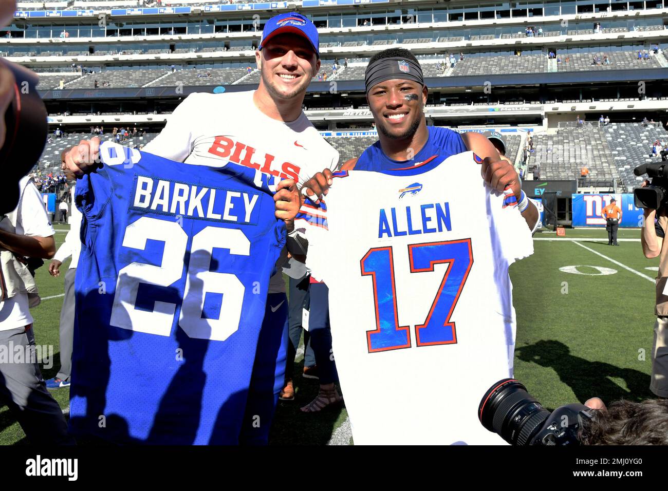 Buffalo Bills Quarterback Josh Allen And New York Giants Running Back ...