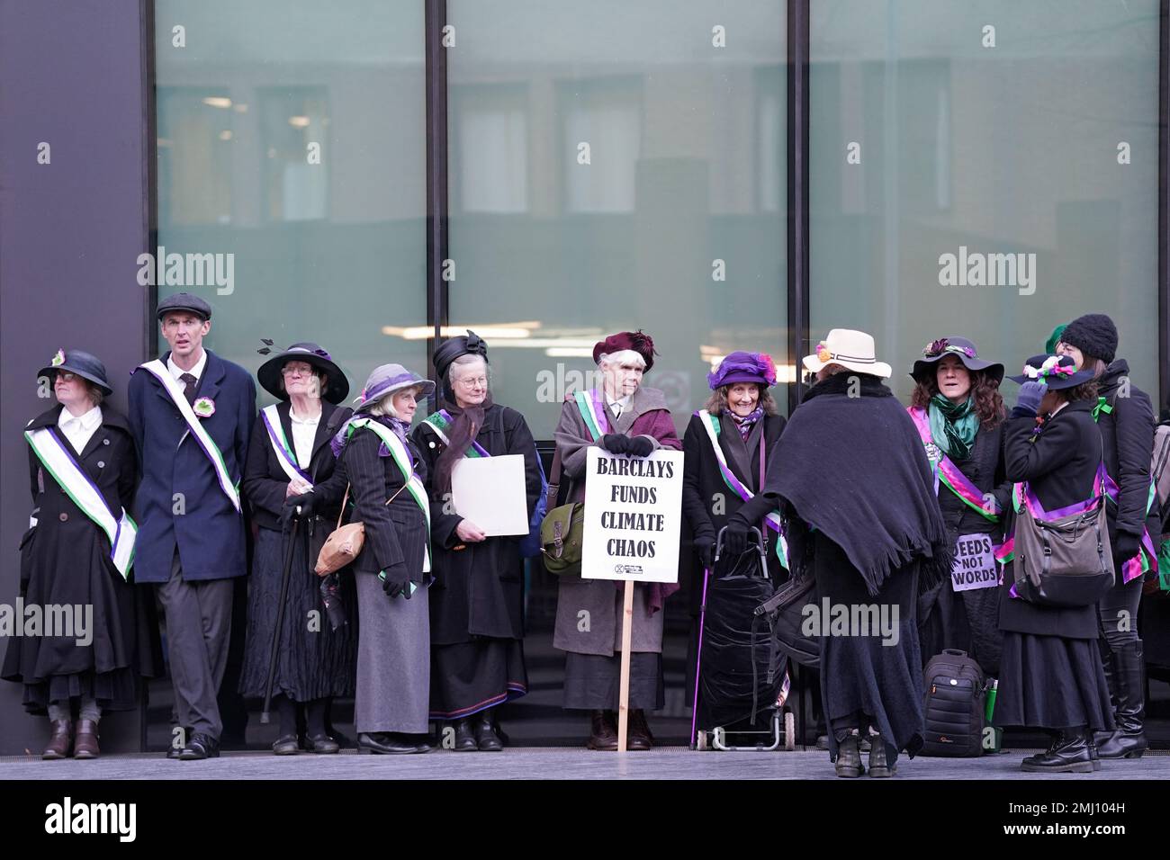 Supporters outside Southwark Crown Court, London, where climate protesters Carol Wood, Sophie Cowen, Lucy Porter, Gabriella Ditton, Rosemary Webster and Zoe Cohen are appearing for sentencing after they were found guilty of causing almost £100,000 in damage for smashing glass windows at the London headquarters of Barclays bank. Picture date: Friday January 27, 2023. Stock Photo