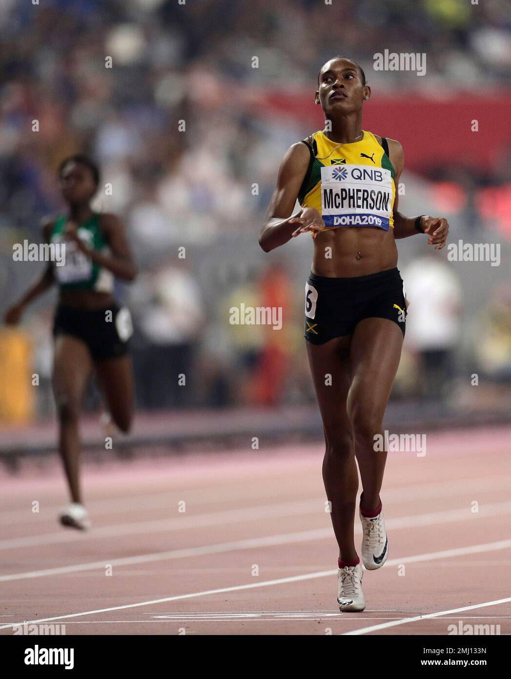 Stephenie Ann Mcpherson, of Jamaica, races in a women's 400 meter