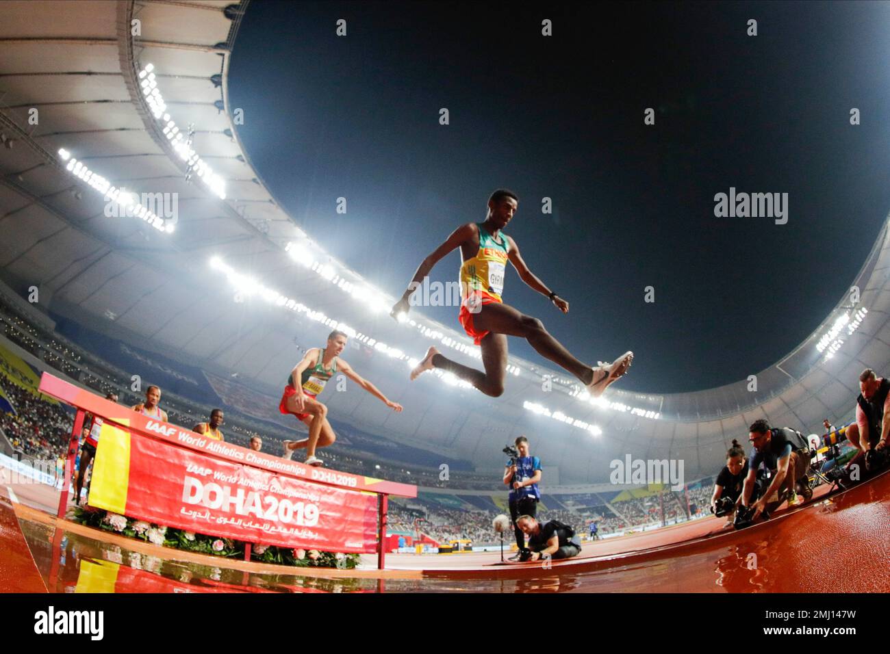 Lamecha Girma, of Ethiopia, competes in a men's 3000 meter steeplechase