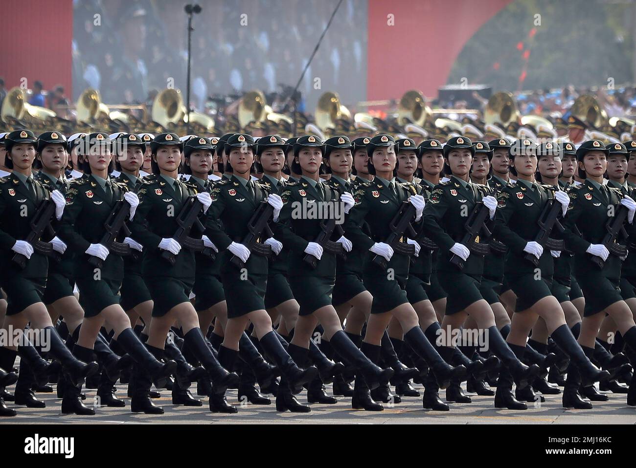 Female soldiers from China's People's Liberation Army (PLA) march in ...