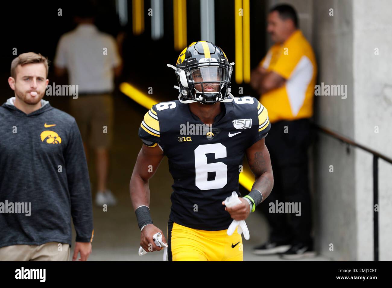Iowa wide receiver Ihmir SmithMarsette runs to the field before an