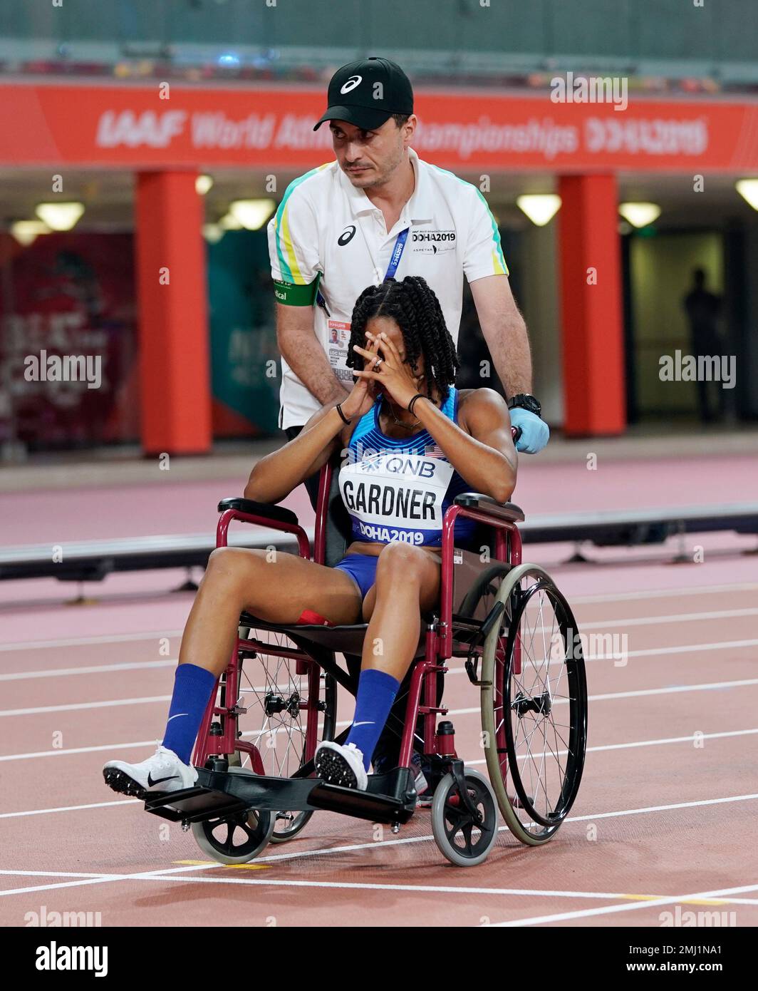 English Gardner, of the United States, is taken off the track in a