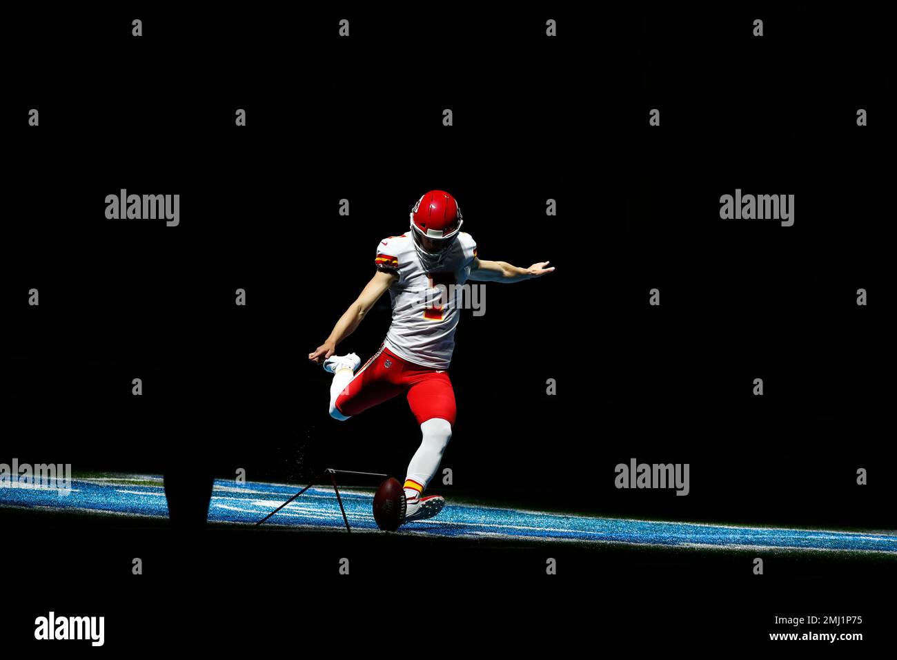 Kansas City Chiefs kicker Harrison Butker practices during pregame of