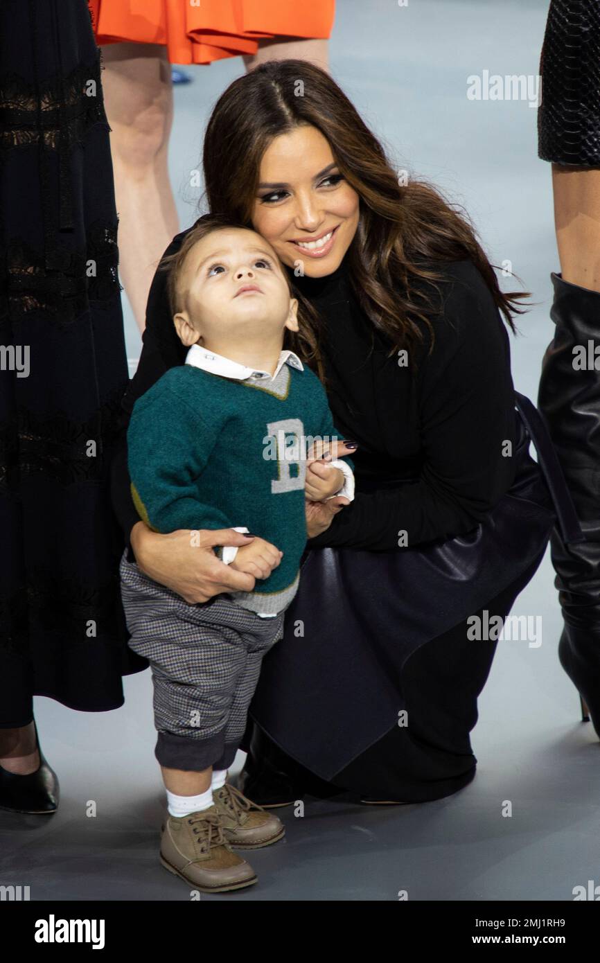 Actress Eva Longoria, carrying her son Santiago Enrique Baston wears