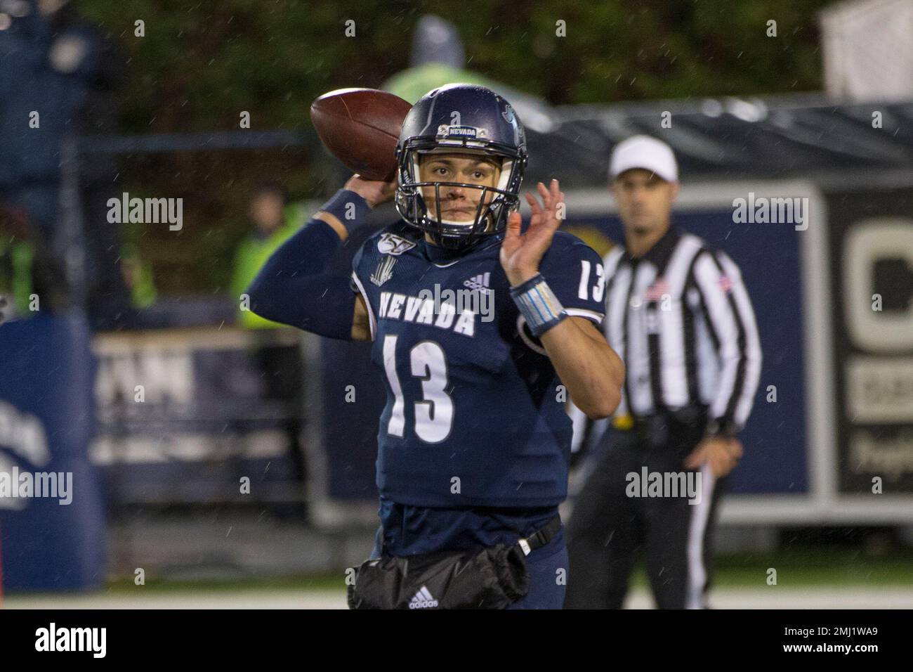 Nevada quarterback Cristian Solano (13) passes the ball against Hawaii in  the second half of an NCAA college football game in Reno, Nev., Saturday,  Sept. 28, 2019. (AP Photo/Tom R. Smedes Stock