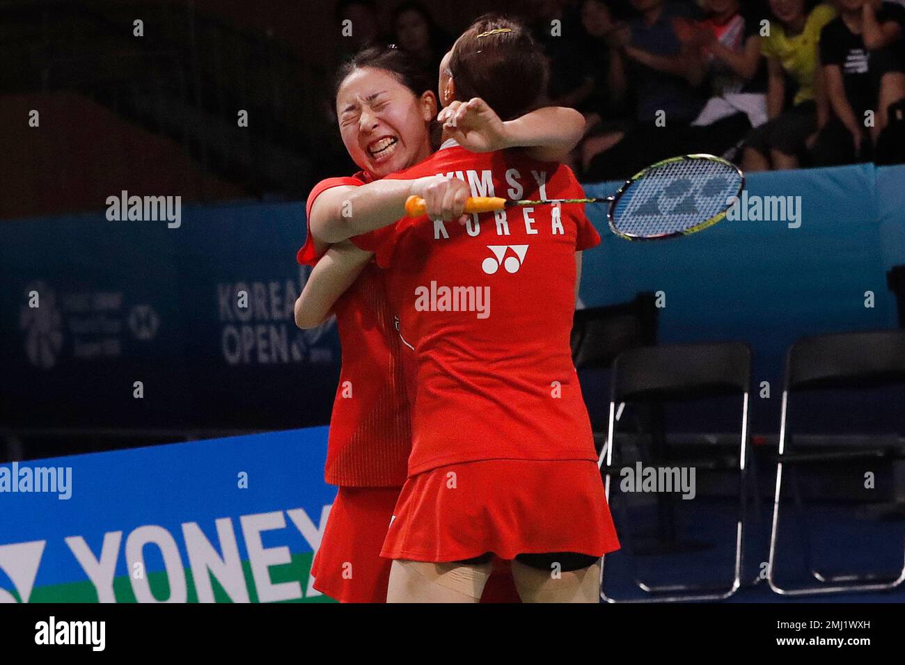 South Koreas Kim So-yeong hugs with Kong Hee-yong, left, after winning against South Koreas Lee So-hee and Shin Seung-chan during the womens doubles final match at the Korea Open Badminton in Incheon,
