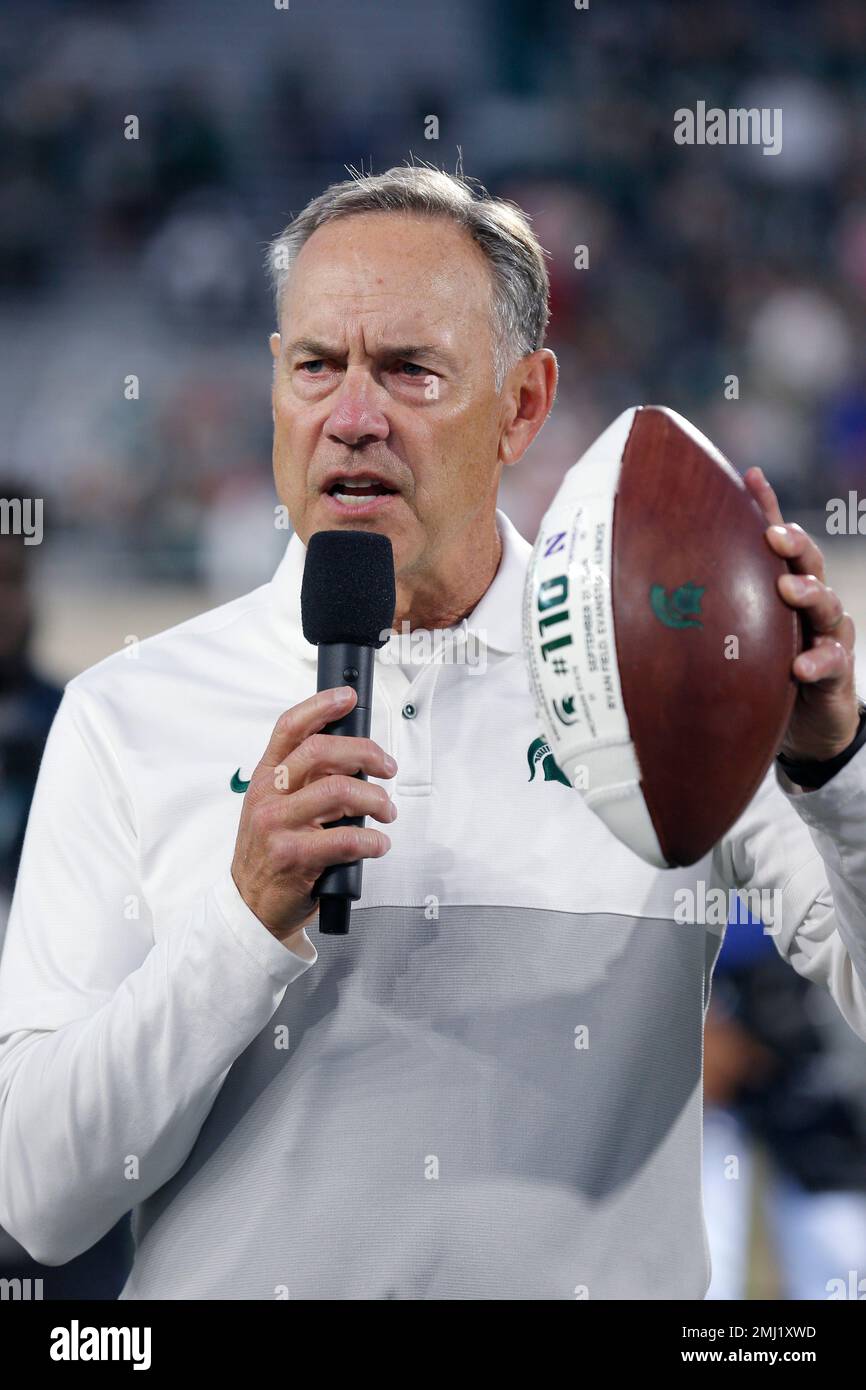 Michigan State coach Mark Dantonio addresses the crowd following an