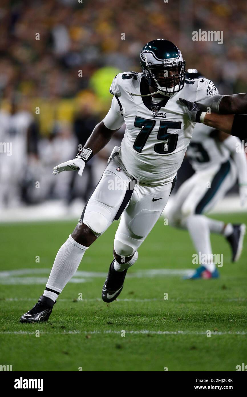 Philadelphia Eagles defensive end Vinny Curry (75) rushes in against the Green  Bay Packers during an NFL football game, Thursday, Sept. 26, 2019, in Green  Bay, Wis. The Eagles defeated the Packers