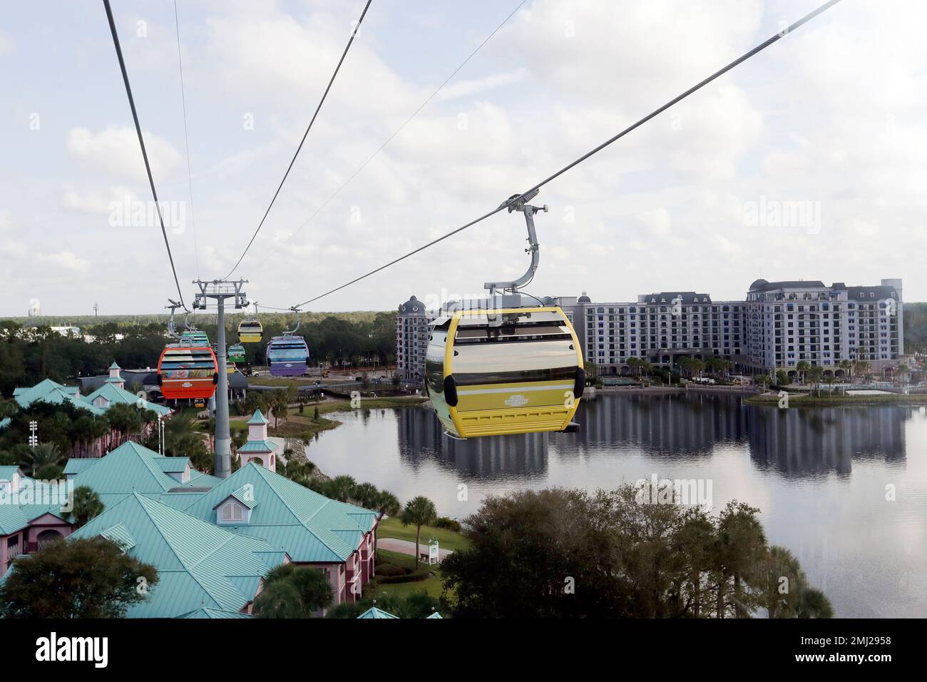 Gondolas move over the Caribbean Beach Resort at Walt Disney World on