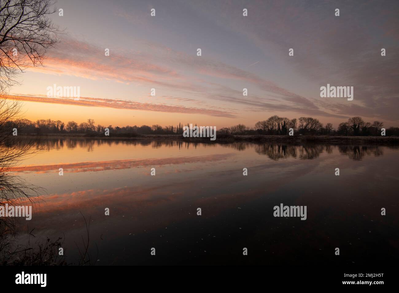 Sunrise reflections on the River Trent at Colwick Park, Nottingham Nottinghamshire England UK