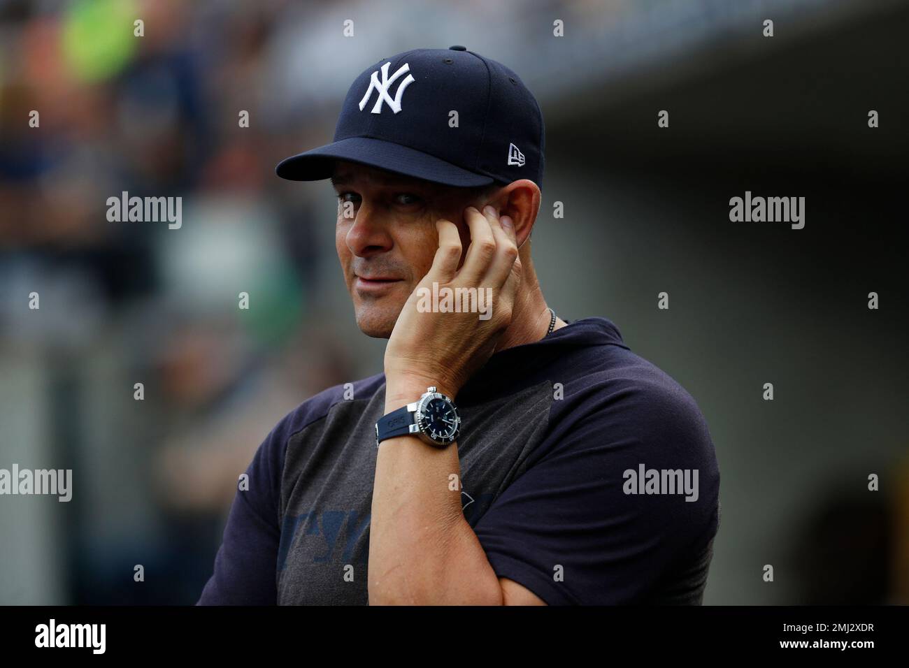 New York Yankees manager Aaron Boone watches against the Detroit Tigers in the first inning of a baseball game in Detroit, Tuesday, Sept