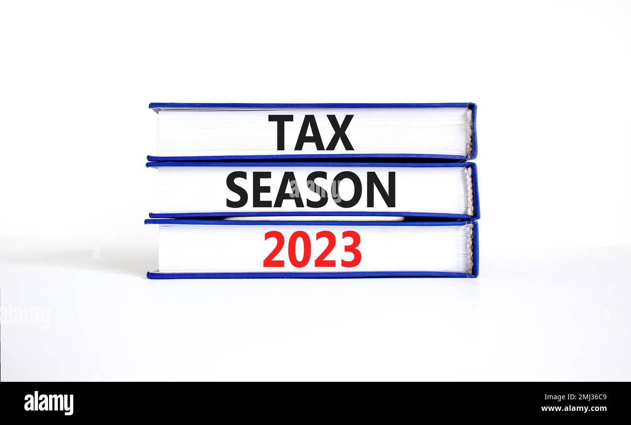 Tax season 2023 symbol. Concept words Tax season 2023 on books on a