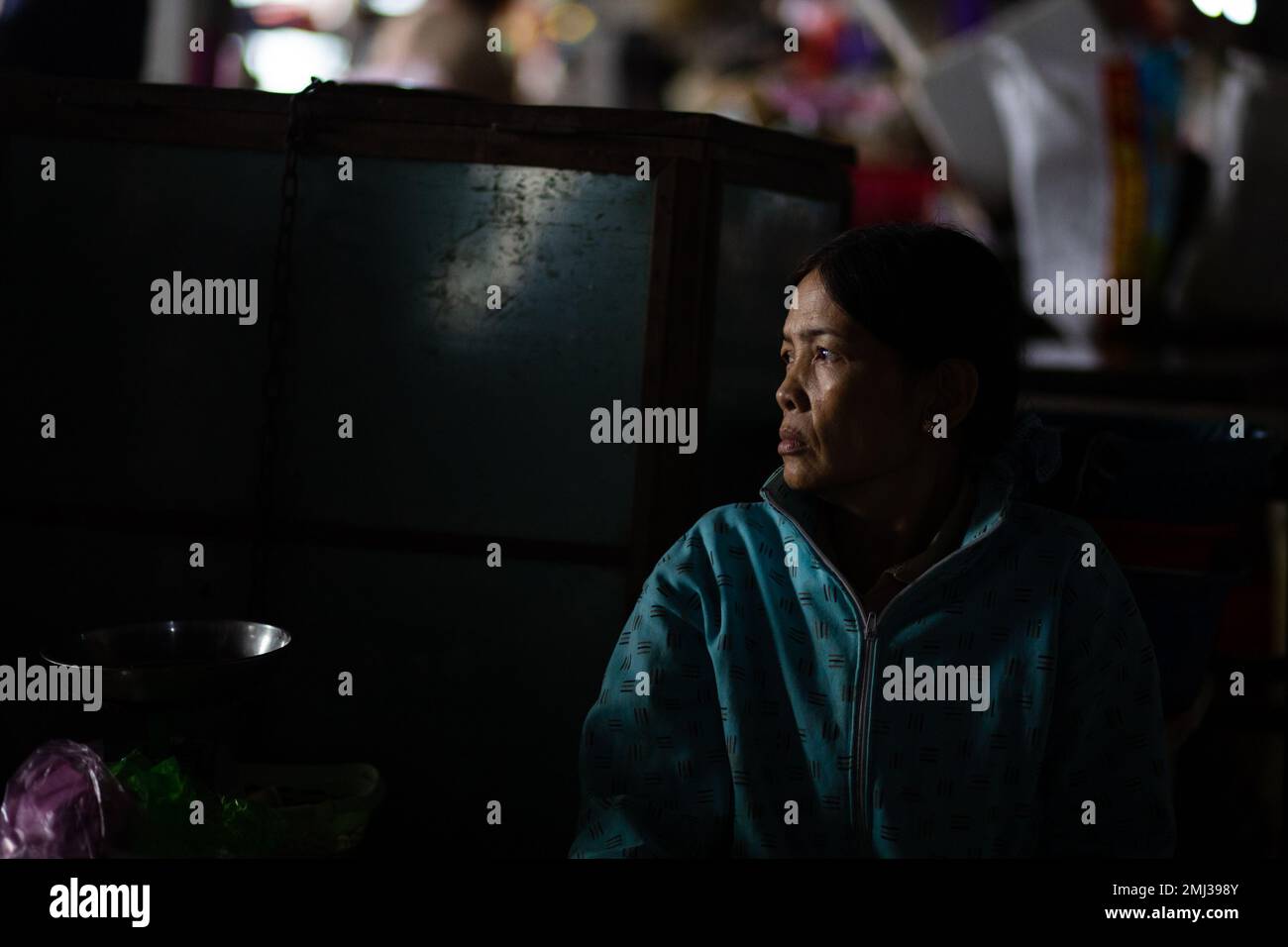 Portrait of Vietnamese Woman in Market - Hoi An Vietnam Stock Photo
