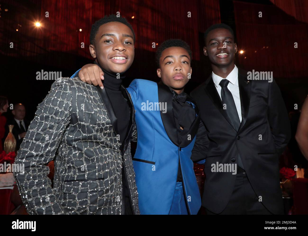 Caleel Harris, from left, Asante Blackk and Ethan Herisse attend the