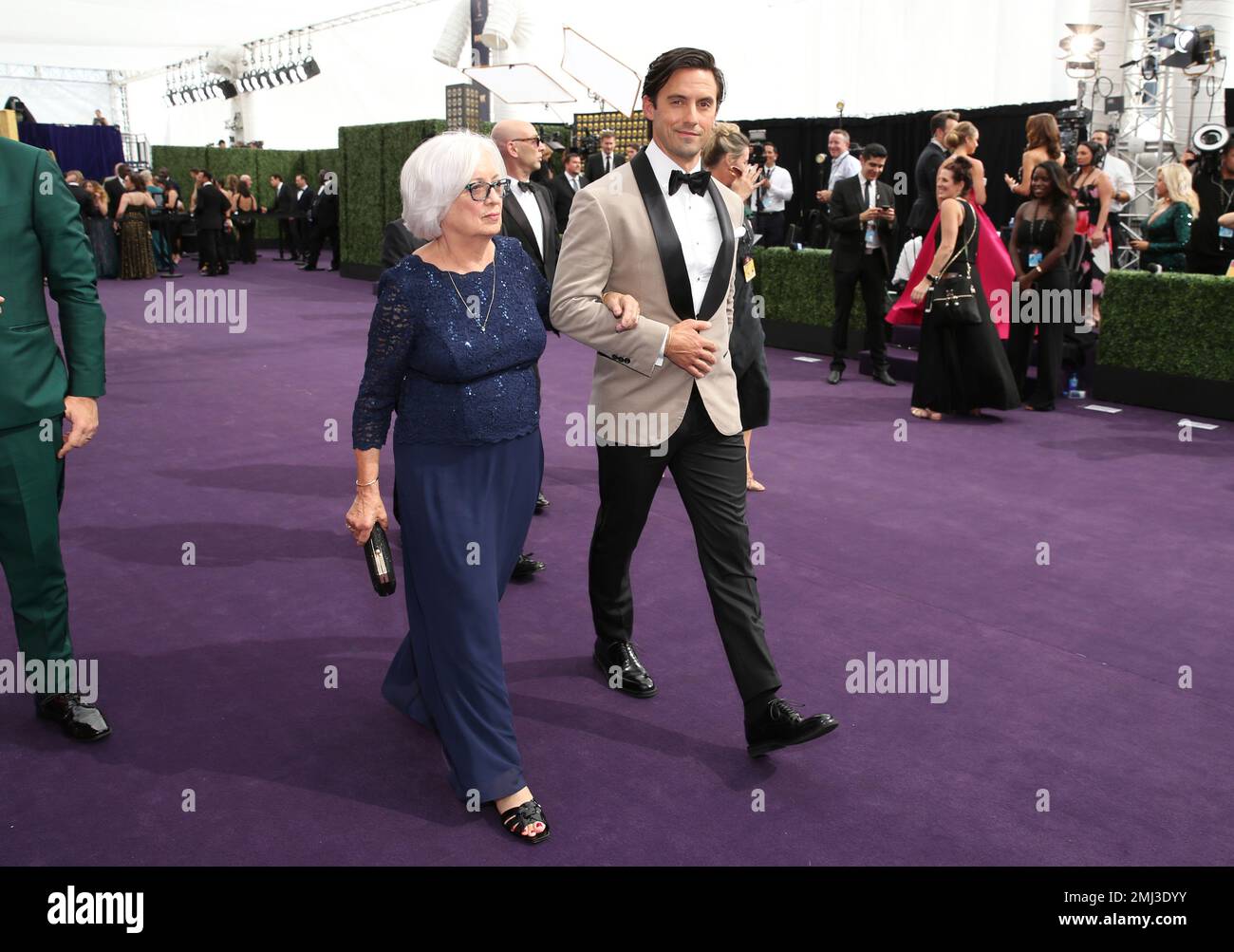 Milo Ventimiglia, right, and Carol Ventimiglia arrive at the 71st Primetime Emmy Awards on
