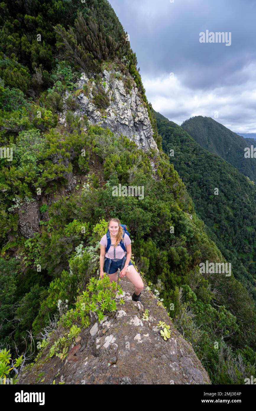 Hiker on the ridge of Pico do Alto, Madeira, Portugal Stock Photo