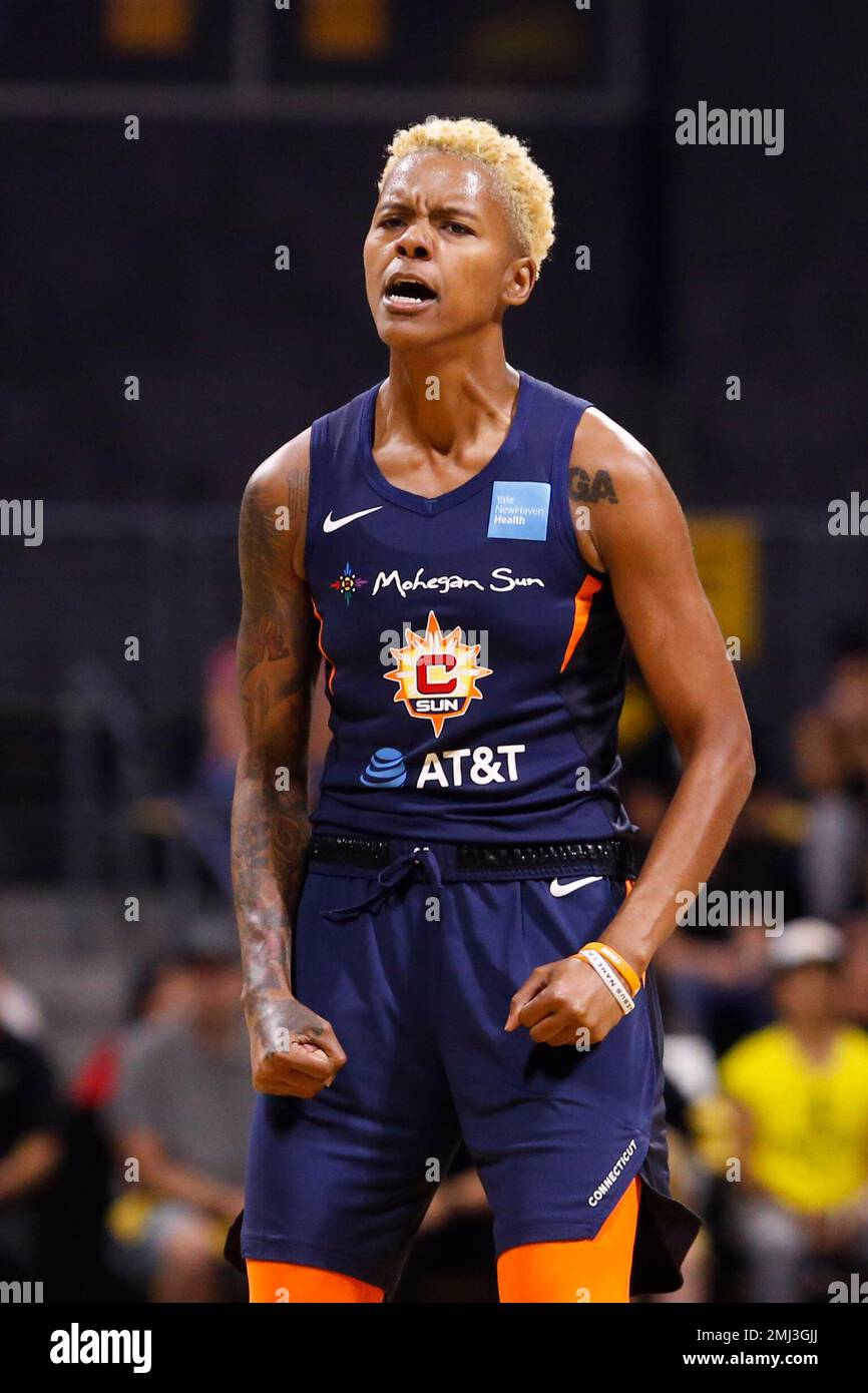 Connecticut Sun's Courtney Williams (10) reacts after making