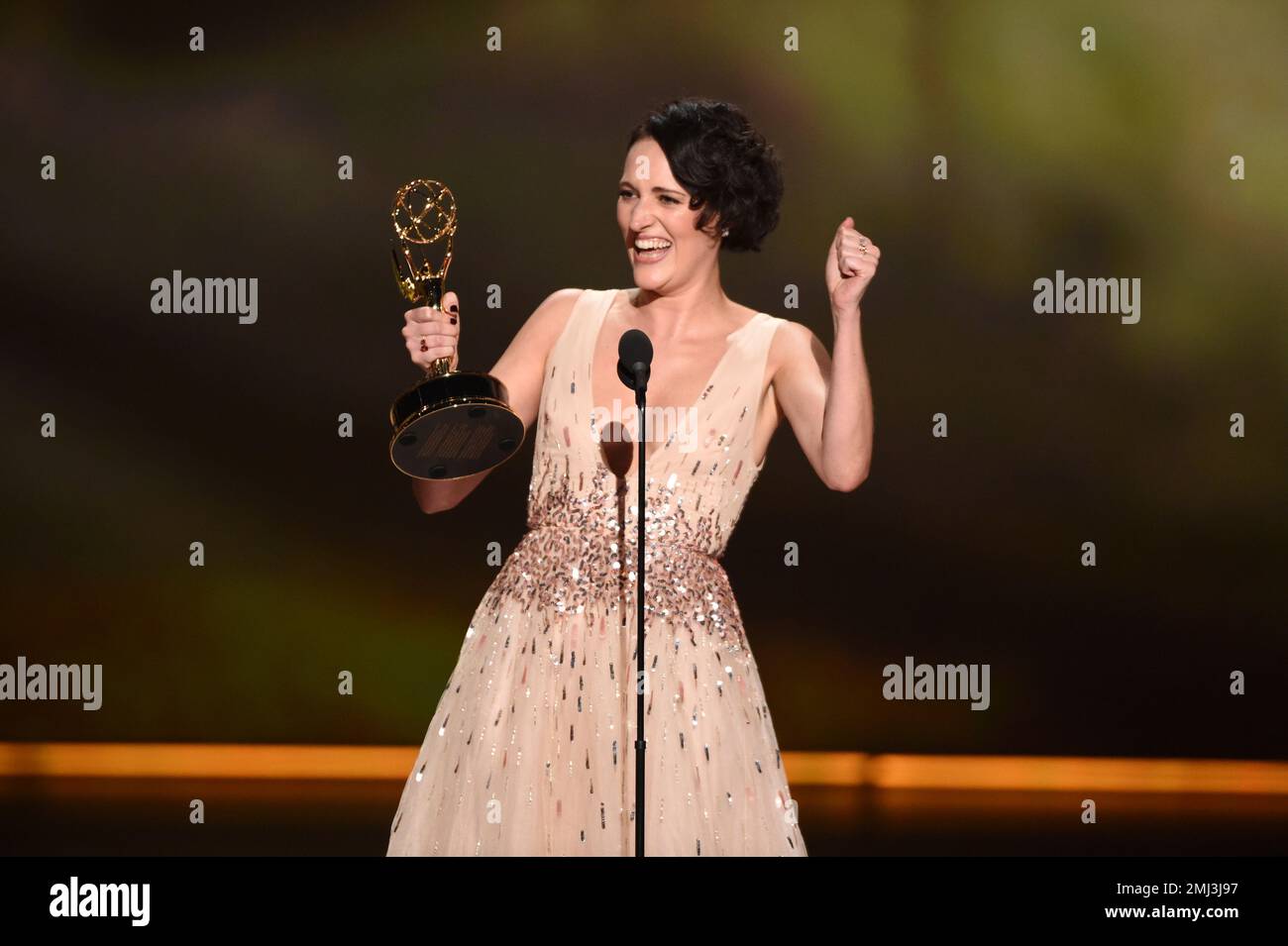 Phoebe WallerBridge accepts the award for outstanding lead actress in