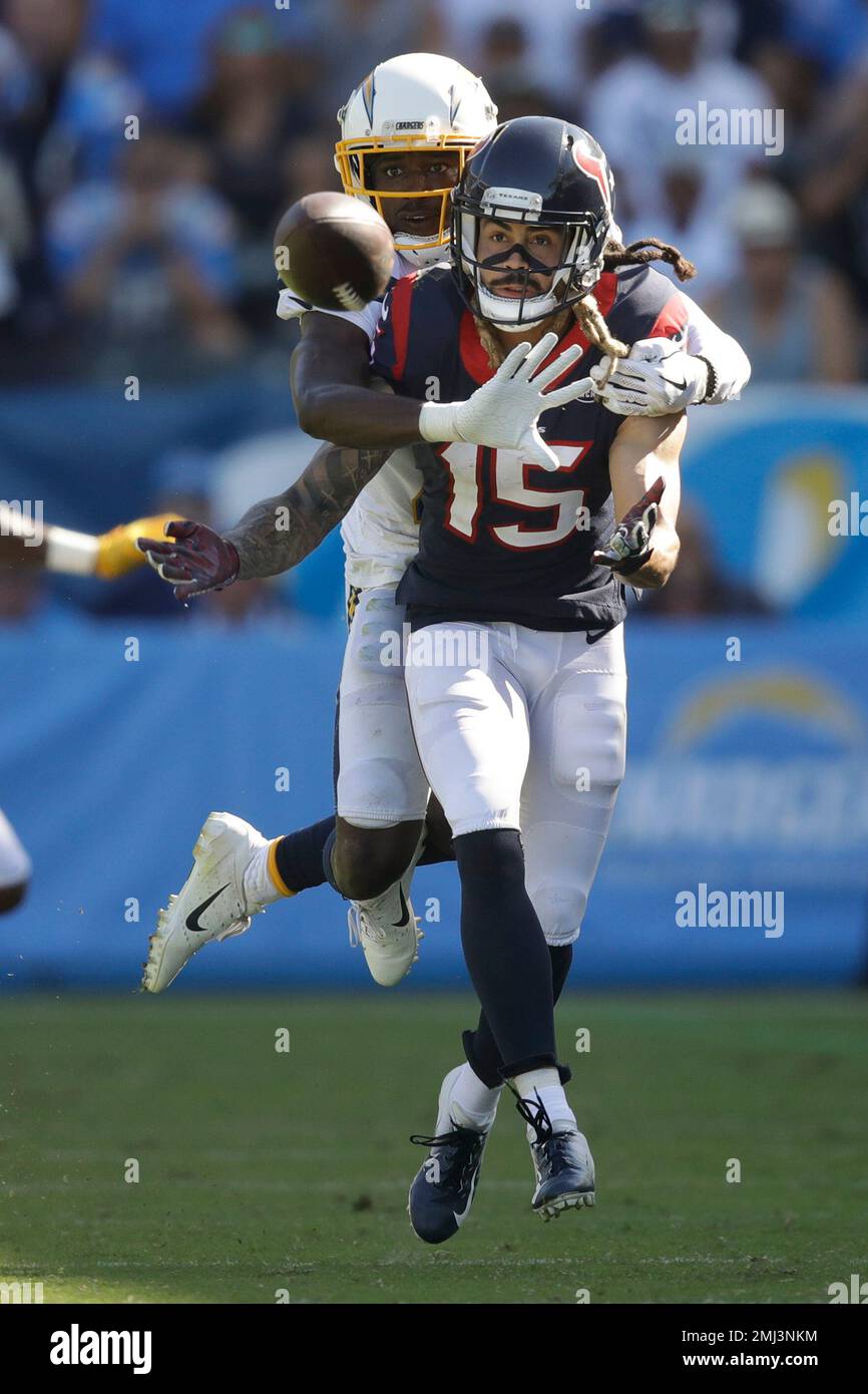 Los Angeles Chargers defensive back Brandon Facyson breaks up a pass intended for Houston Texans wide receiver Will Fuller during the second half of an NFL football game Sunday, Sept