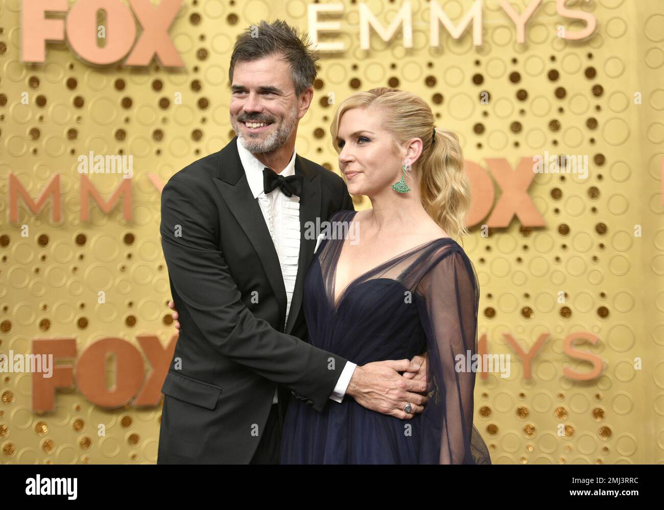 Graham Larson, left, and Rhea Seehorn arrive at the 71st Primetime Emmy