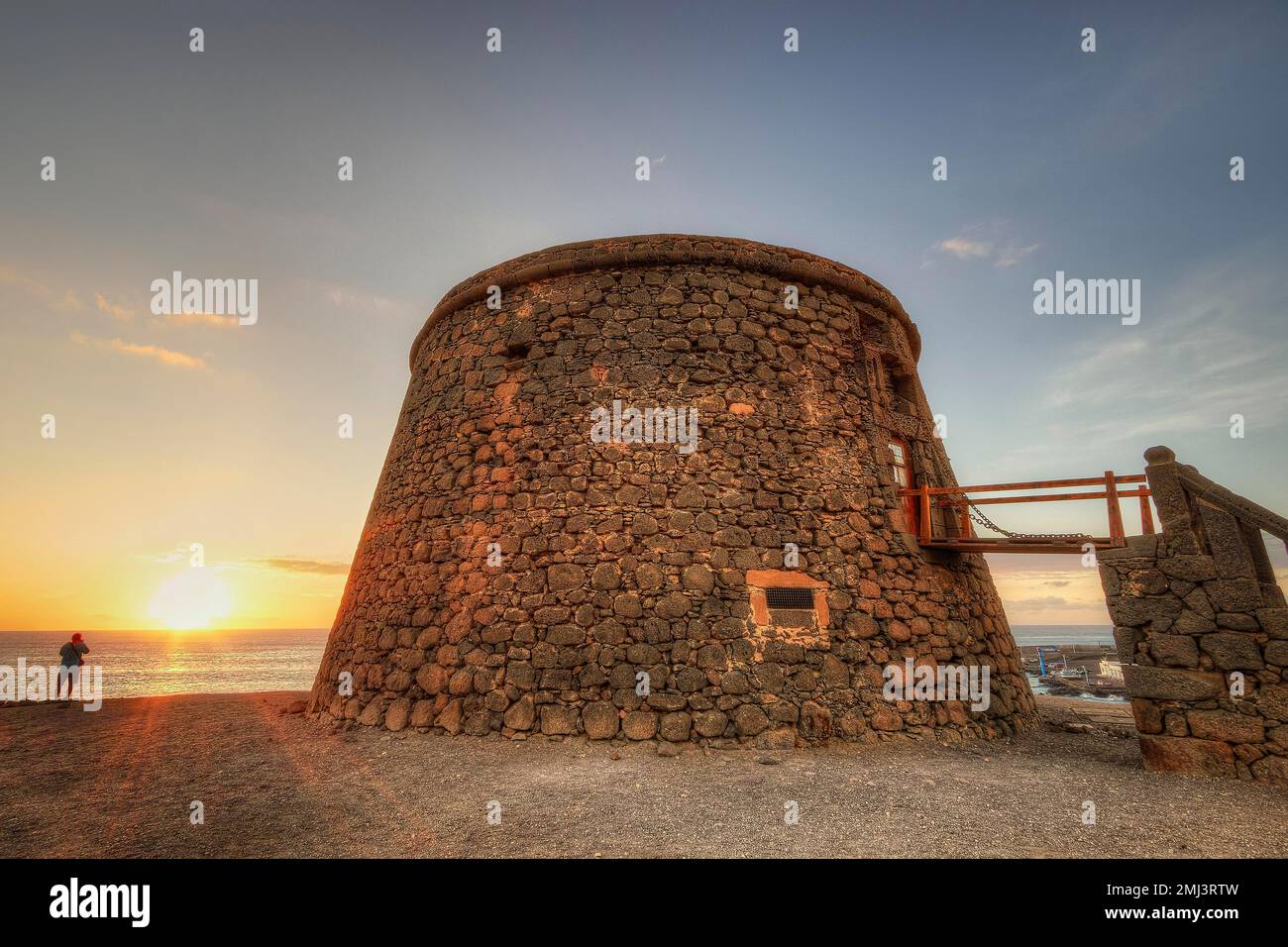 Castillo de Toston, round fortress tower, HDR, backlight, sunset