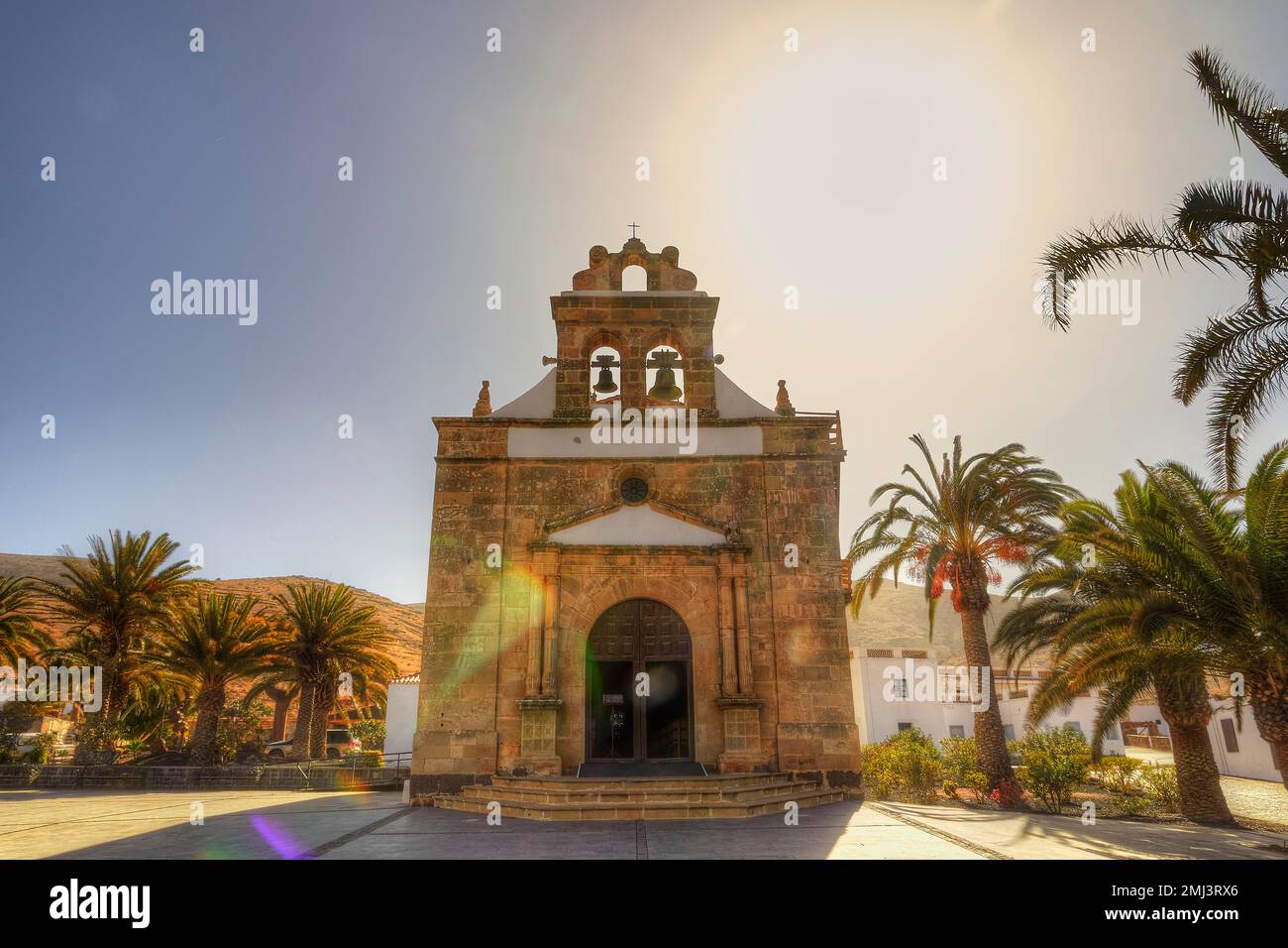 Iglesia de Nuestra Señora de la Peña, church, portal, wide angle, palm trees, backlight, HDR, Vega Rio Las Palmas, island interior, Fuerteventura, Can Stock Photo