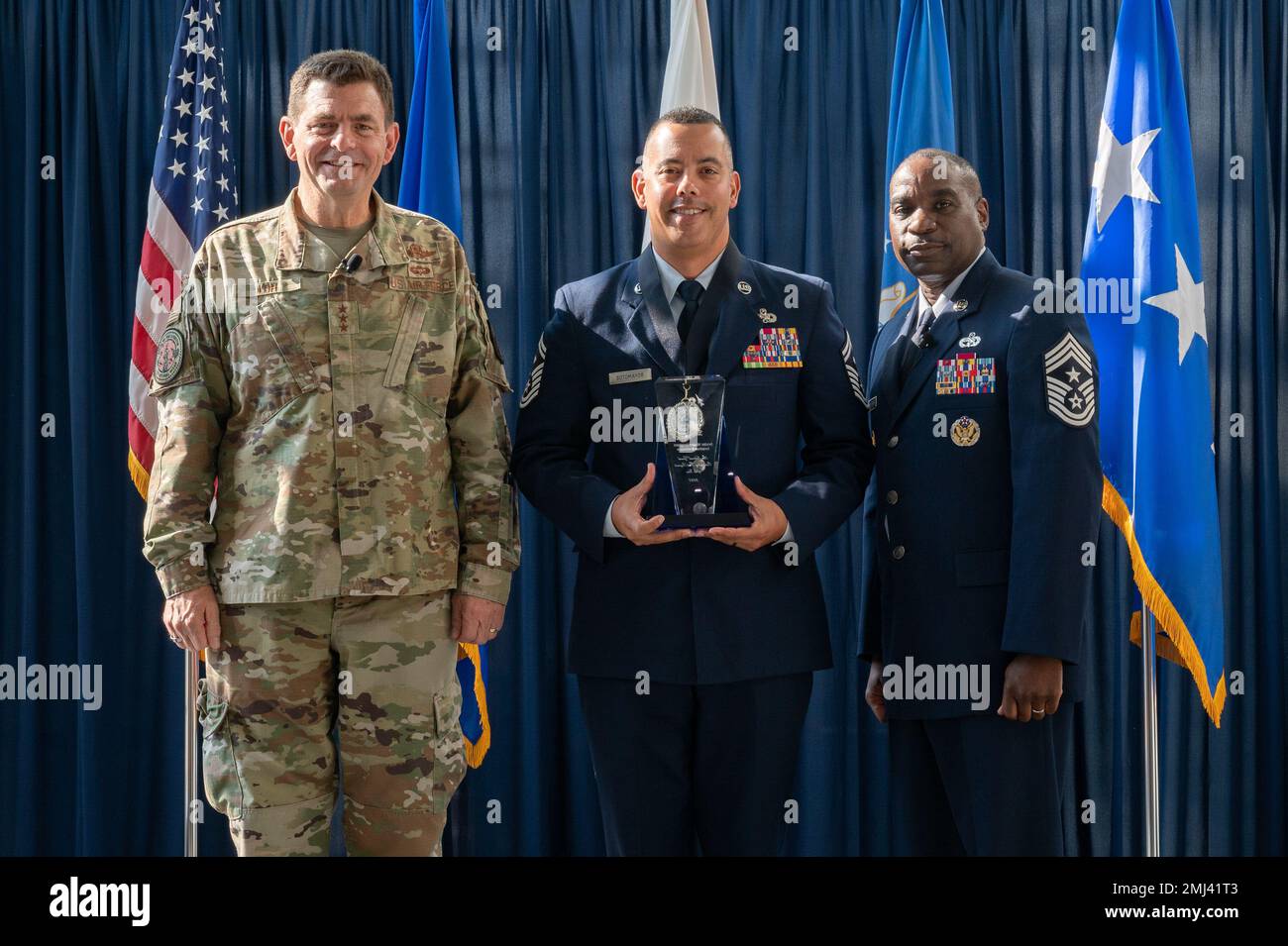 U.S. Air Force Senior Master Sgt. Jonathan Sotomayor, center, of the ...