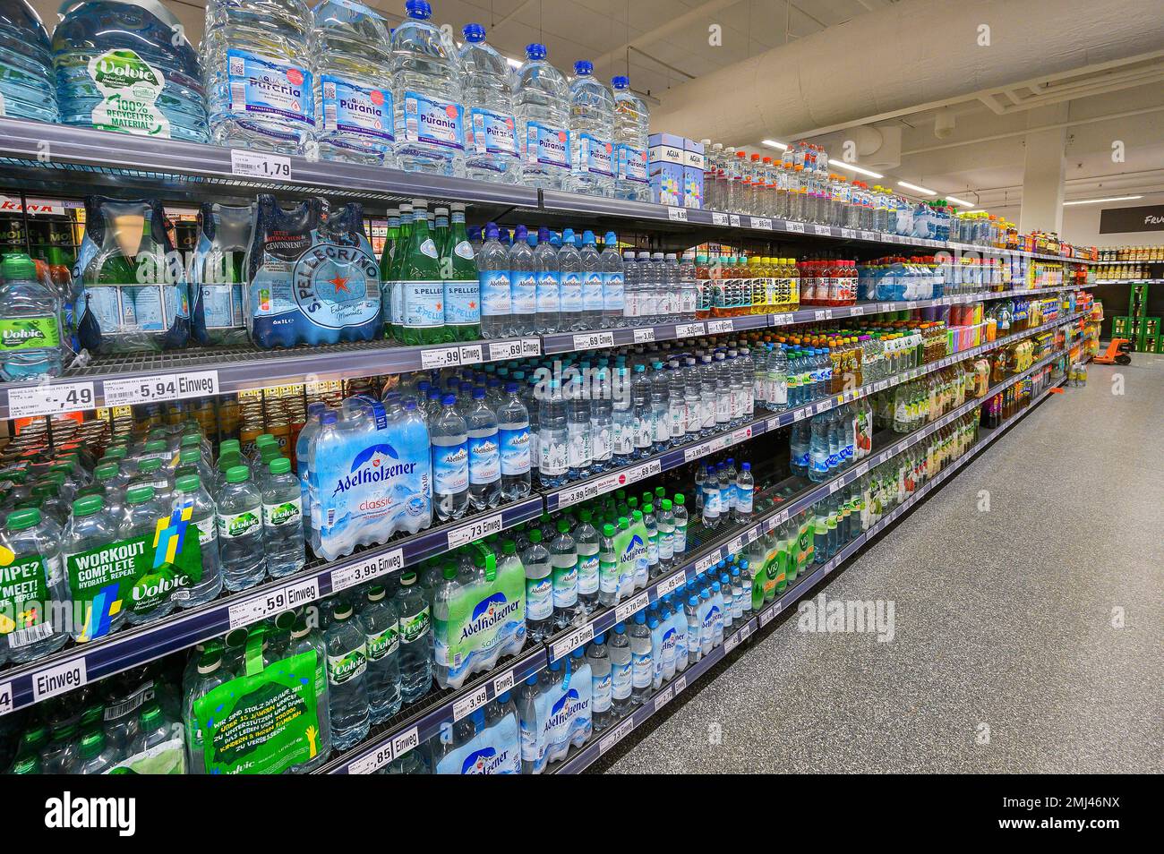 Shelves with mineral water and beverages in the wholesale market