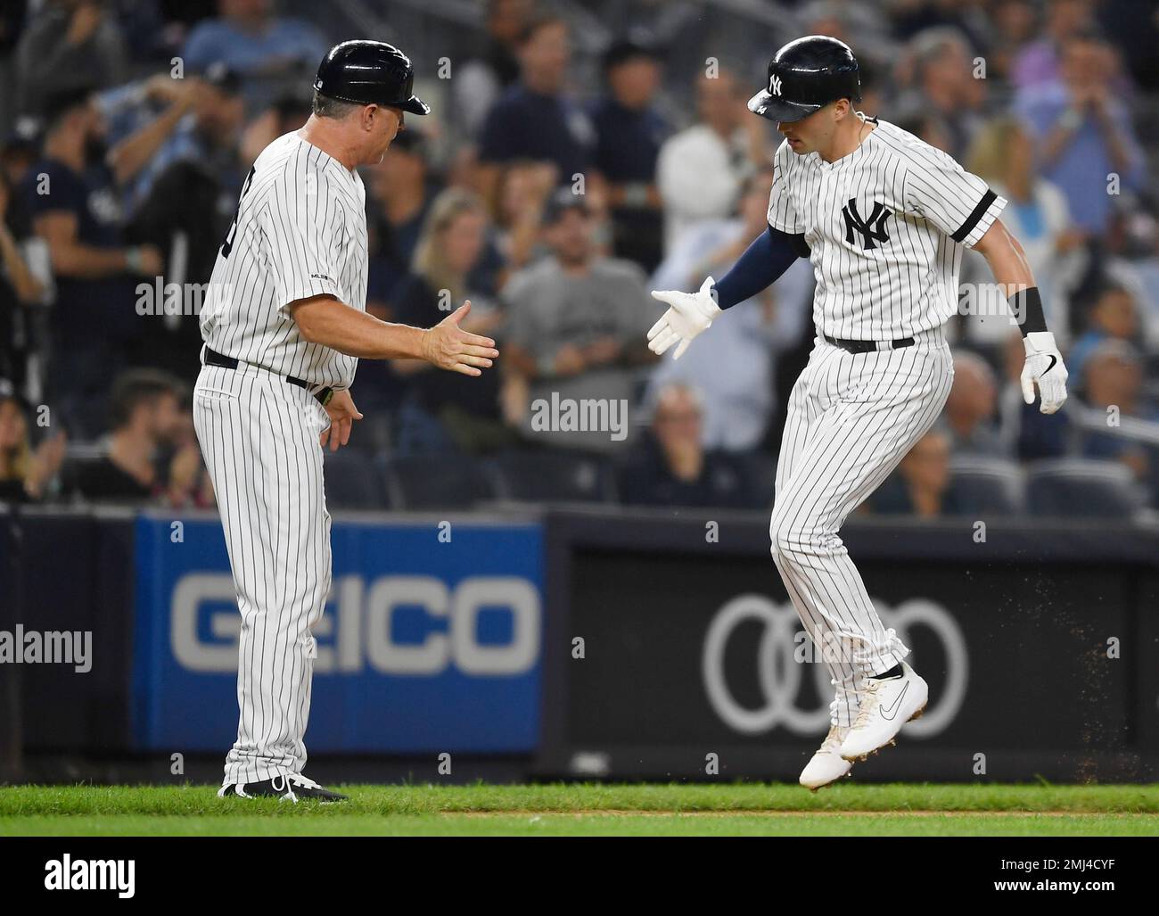 New York Yankees' Tyler Wade (14) celebrates with teammates after