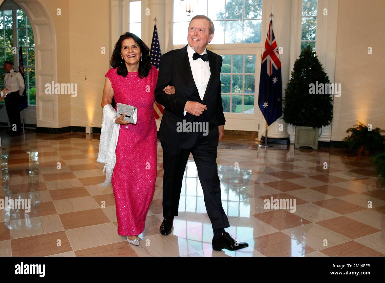 Television presenter Lou Dobbs, right, and wife Debi Segura arrive for a State Dinner with Australian Prime Minister Scott Morrison and President Donald Trump at the White House, Friday, Sept. 20, 2019,