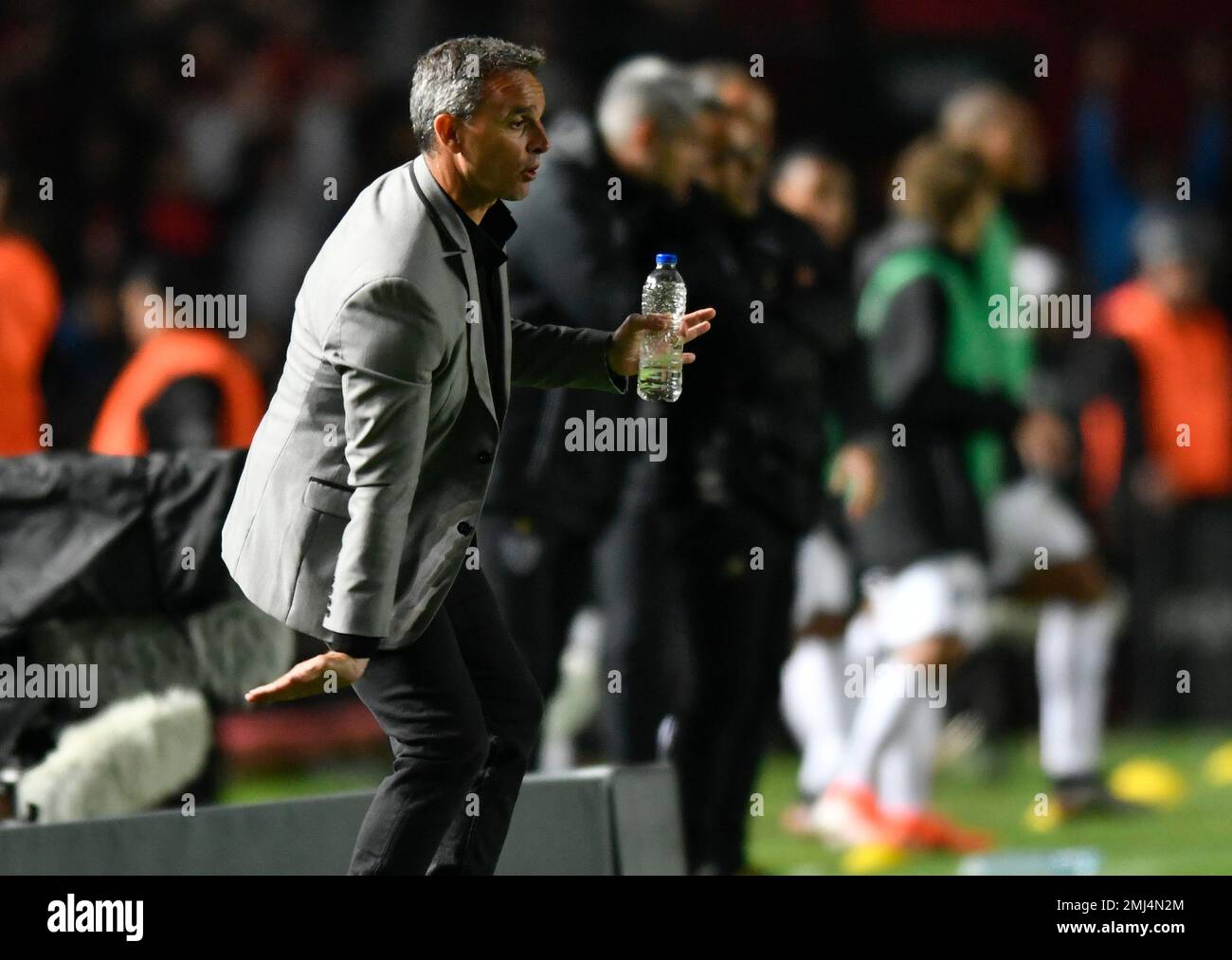 Pablo Lavallen, coach of Argentina's Colon, gives instructions to his  players during a semifinal first leg Copa Sudamericana soccer match against  Brazil's Atletico Mineiro at the Brigadier General Estanislao Lopez stadium  in