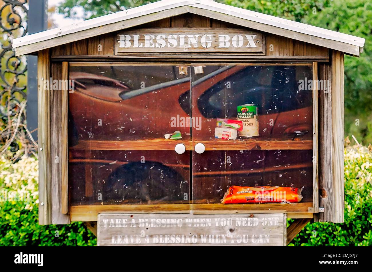 A blessing box is pictured at Saint Philip Neri Catholic Church, Jan. 1, 2023, in Theodore, Alabama. Blessing boxes are free community pantries. Stock Photo