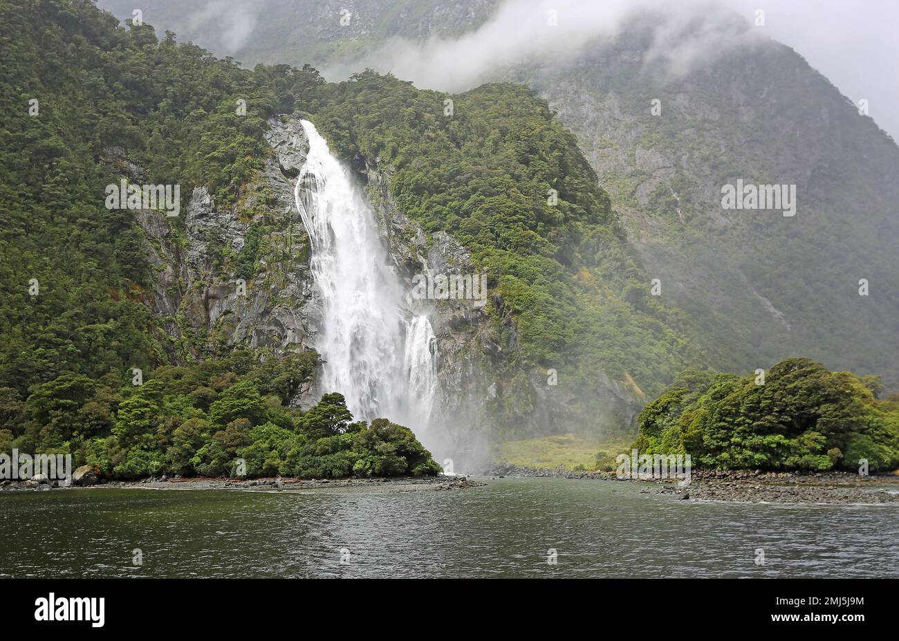 Mist of Lady Bowen Falls - Fiordland NP, New Zealand Stock Photo
