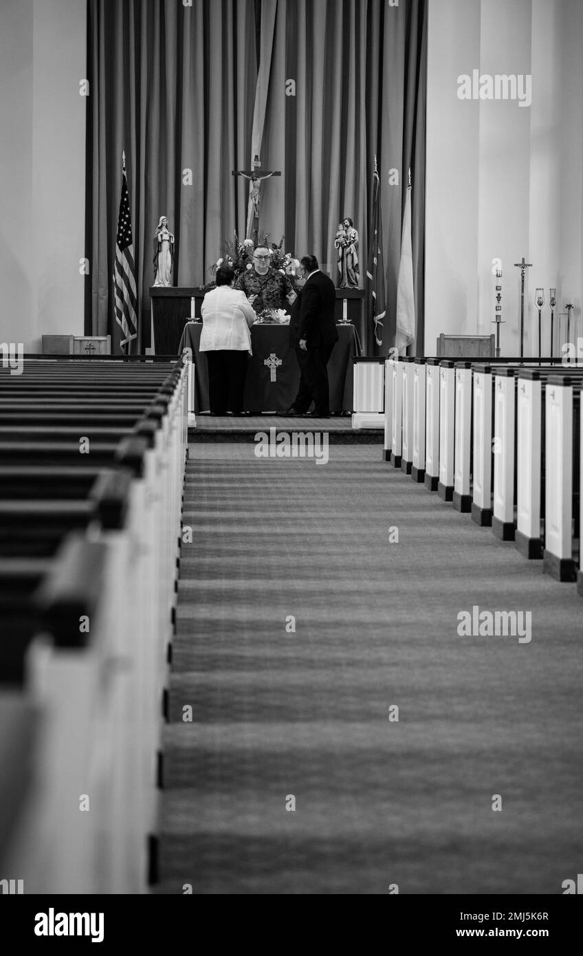 QUANTICO, Va. (Aug. 25, 2022) — Secretary of the Navy Carlos Del Toro and his wife, Betty Del Toro, visits the U.S. Marine Memorial Chapel in Quantico Aug. 25, 2022. Del Toro visited to pay respects to the 13 service members lost during the bombing attack at Hamid Karzai International Airport in Kabul, Afghanistan, Aug. 26, 2021. Stock Photo