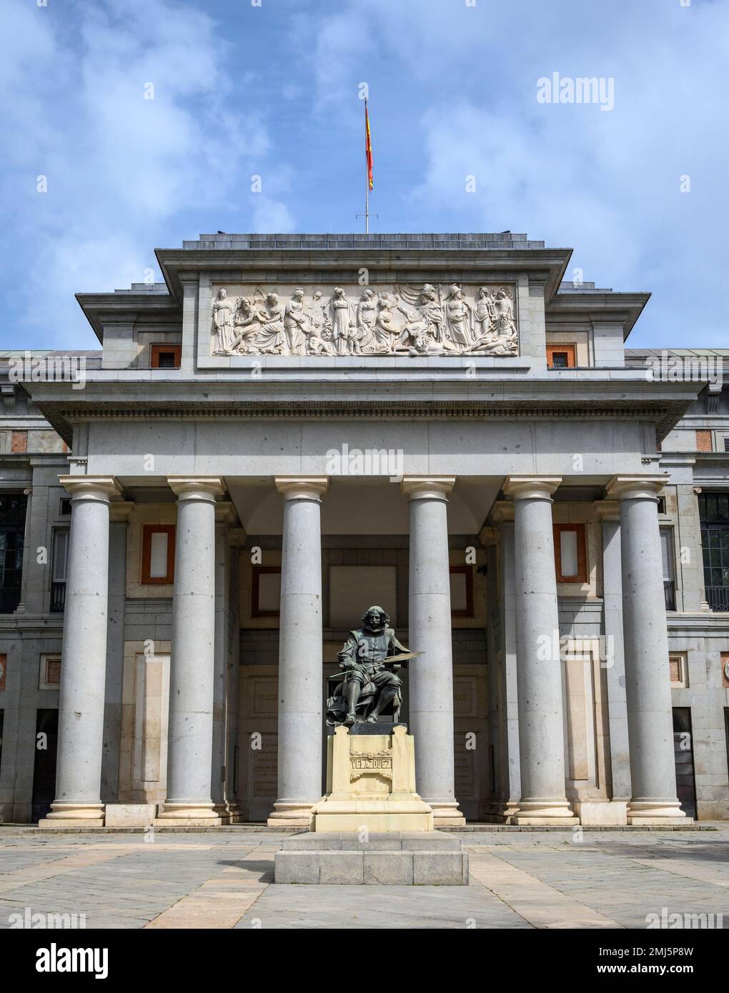 Entrance to the Prado Museum in Madrid, Spain, with a statue of painter Diego Velázquez. Stock Photo